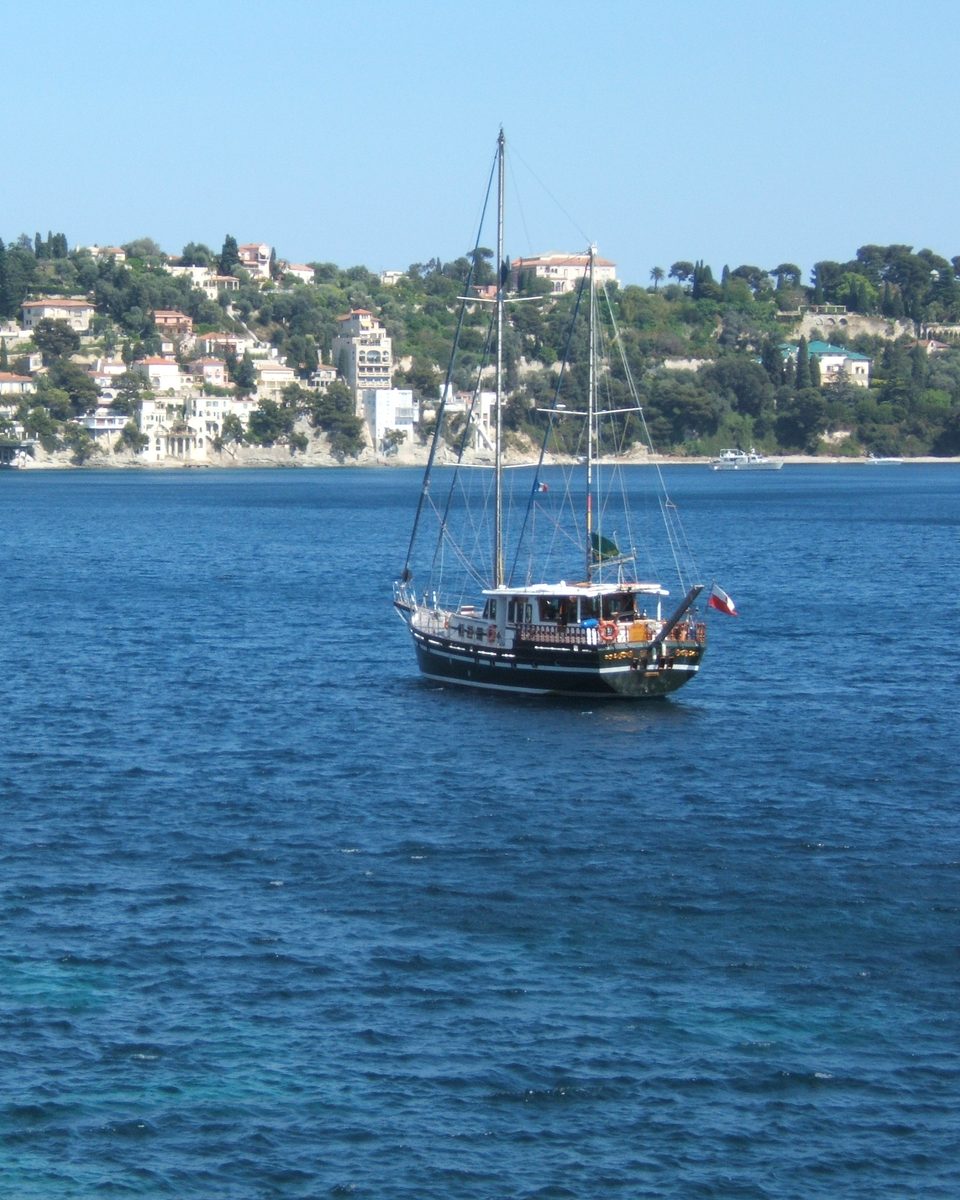A sailing yacht in the bay of Villefranche-sur-Mer